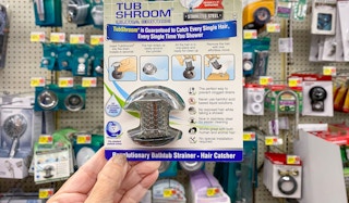 hand holding tubshroom bathtub strainer at walmart