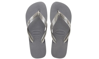 A pair of silver Havaianas steel grey flip flops.