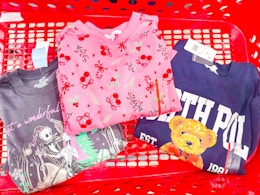 3 Women's sweatshirts in Target shopping basket