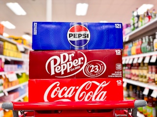3 soda 12-packs sitting on a target cart