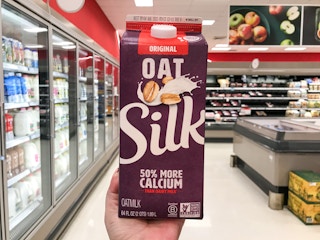 hand holding silk oatmilk at target
