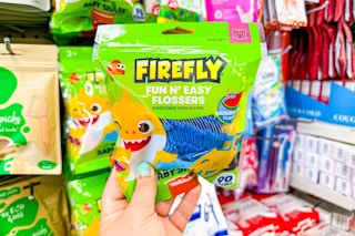 person holding a bag of firefly flossers