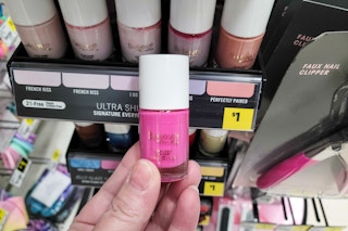 hand holding bottle of believe beauty nail polish at dollar general