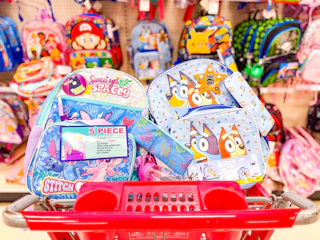 2 character backpack sets sitting in a target cart
