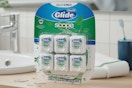 oral b scope floss pack on bathroom counter