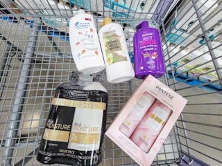 cart containing tresemme, pantene, head and shoulders, and aussie shampoo and conditioner products