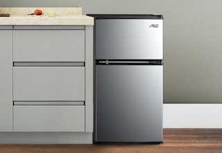 a stainless steel arctic king mini fridge