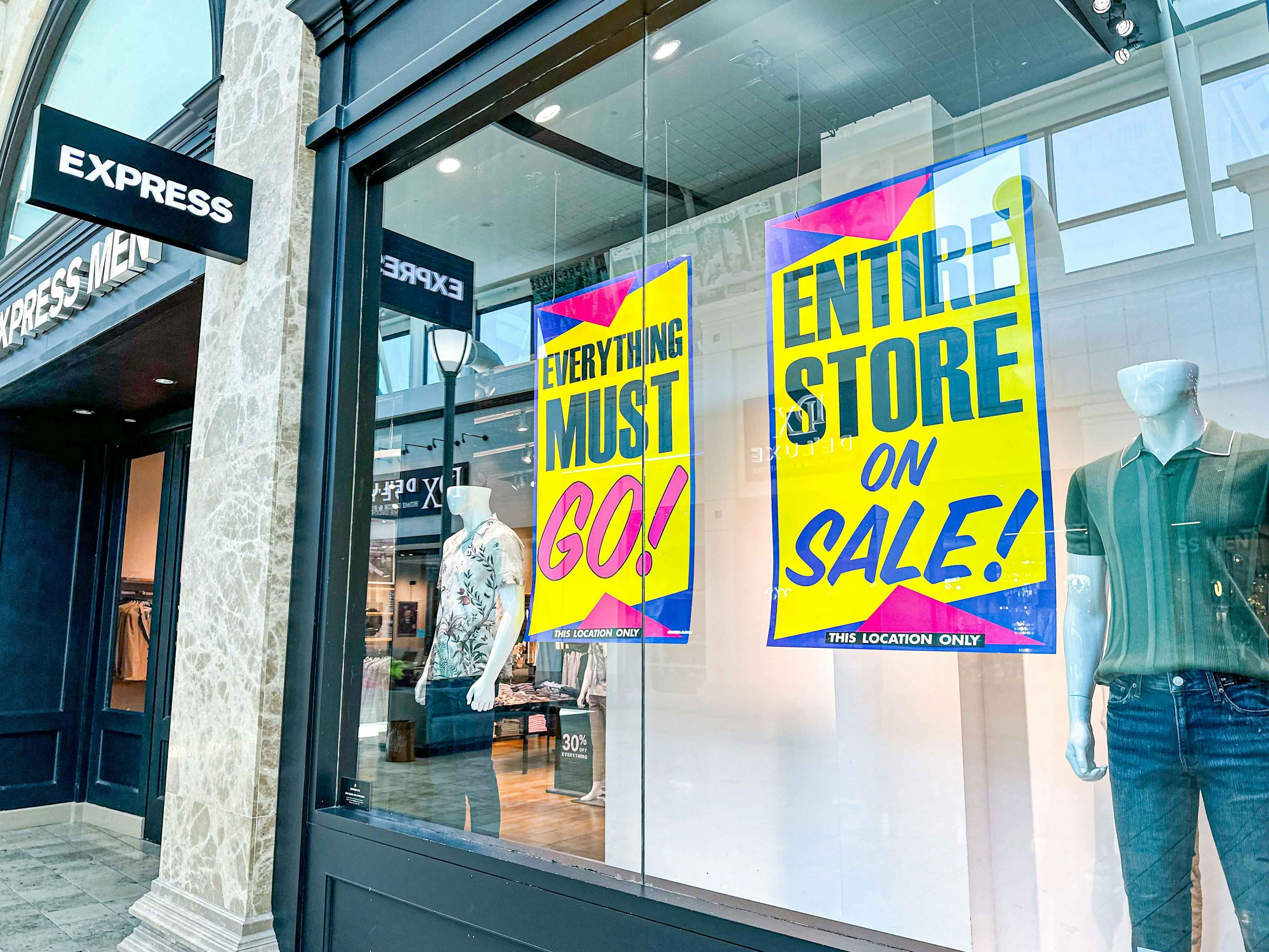 express store closings liquidation 30 to 50 percent off window signage