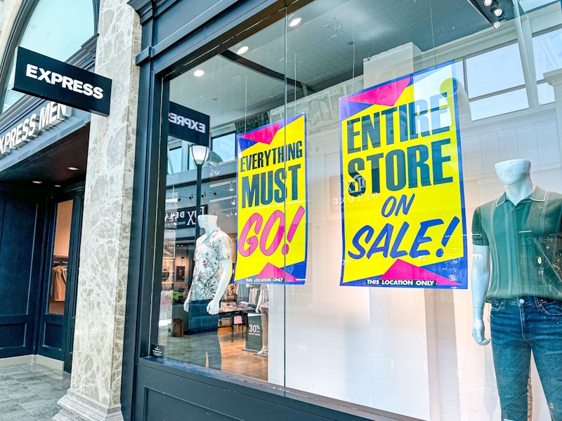 express store closings liquidation 30 to 50 percent off window signage