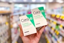 person holding 2 cerave cleansing bars in an aisle