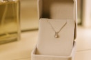 a diamond necklace in a jewelry box 