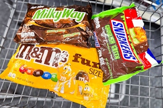 m&m's, milky way, and snickers candy bags in a cart
