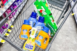 mr clean, arm and hammer, snuggle, cascade, and 7up products in a cart