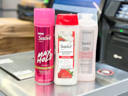 3 suave hair care products sitting in front of checkout