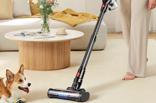 a woman vacuuming her living room