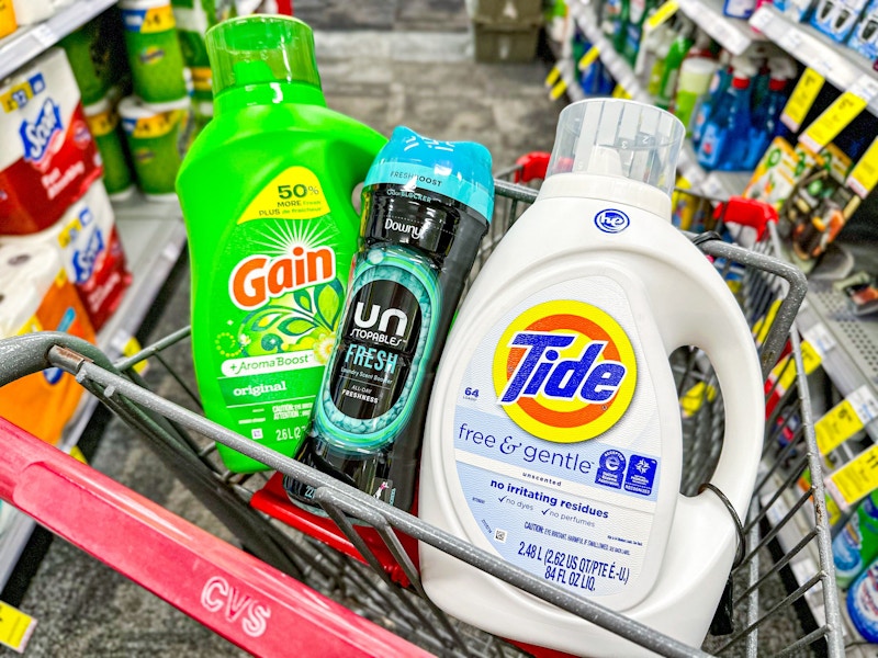 gain and tide detergent with downy scent boosters in a cvs cart