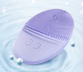 a purple sonic facial brush