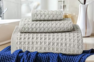 Lifestyle images of three Waffle Cashmere Cotton Bath Towels