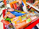 nerf blasters sitting in a target cart