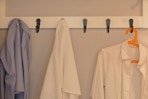 wall hooks holding clothes