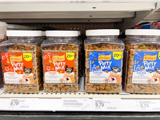 purina friskies 20-ounce party mix cat treats sitting on a target shelf
