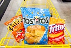 cheetos, tostitos, and fritos in yellow shopping cart