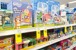 toys on a shelf with 50% off signs