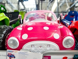 pink and white polka dot ride on car