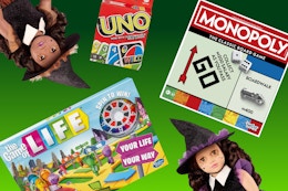 Our Generation Dolls, Uno Card game, Monopoly classic, and The Game of Life