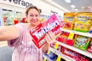 chelsea holding twizzlers candy