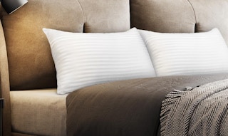 two pillows on a bed