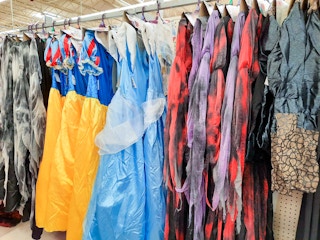 halloween costumes hanging in aisle
