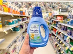 hand holding snuggle softener in walgreens