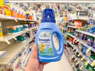hand holding snuggle softener in walgreens