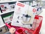 dash stand mixer sitting on top a target cart