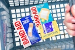 band-aid and neosporin in a shopping basket