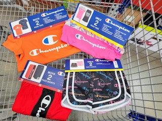 kids champion tees & shorts sets in a cart