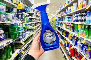 hand holding true living diamond dish spray at dollar general