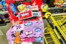 hershey's and ferrara halloween candy in a yellow shopping cart