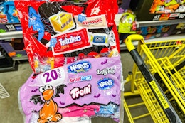 hershey's and ferrara halloween candy in a yellow shopping cart