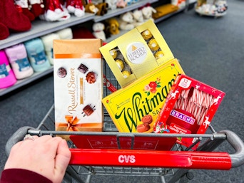 cvs shopping cart with russell stover, whitman's, brach's, and ferrero rocher
