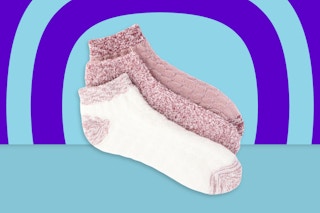 Stock image of Joyspun Women’s Lounge Socks 3-Pack in the color "White Rose" over blue hypnosis background