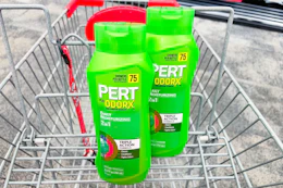 2 bottles of pert shampoo in a cart