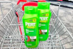 2 bottles of pert shampoo in a cart