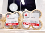 two packs of office depot shipping tape on shelf