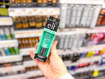 hand holding elf primer in cvs