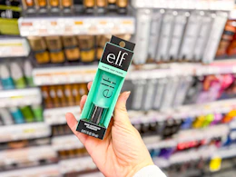 hand holding elf primer in cvs