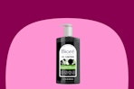 A dark green pump bottle of Biore Deep Pore Charcoal Face Wash
