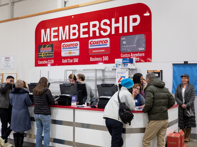 costco-membership-prices-customer-service-counter-gas-savings-executive-dreamstime-2019