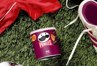 a mini can of Pringles on a soccer field